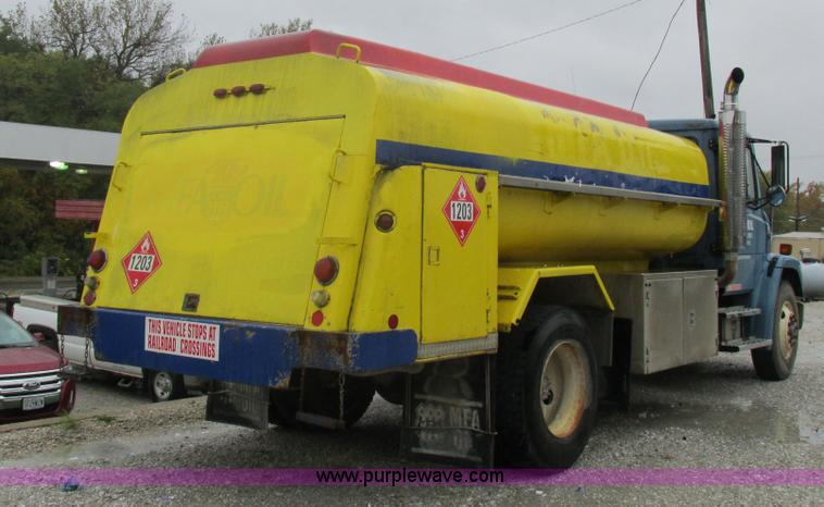 image for item I8910 1999 Freightliner FL70 fuel truck