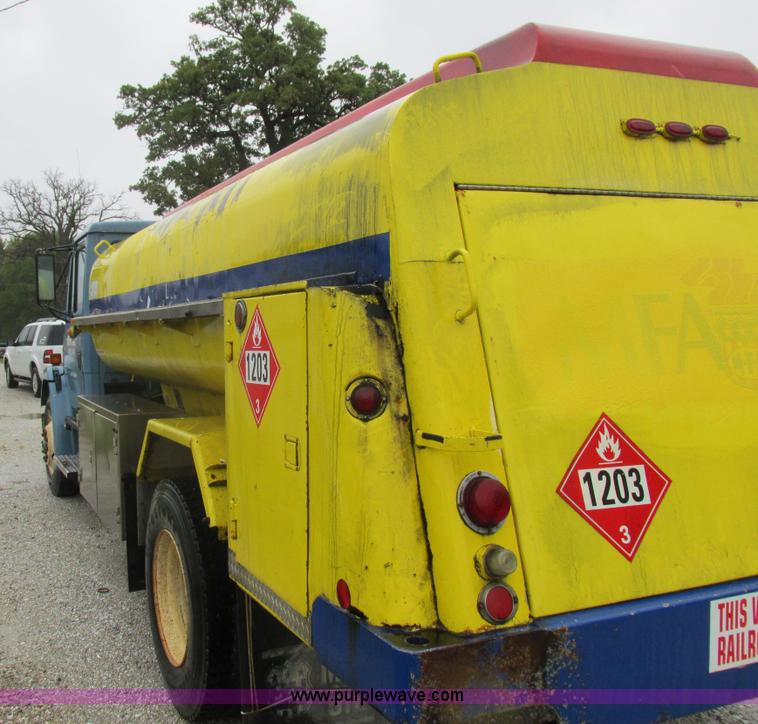 image for item I8910 1999 Freightliner FL70 fuel truck