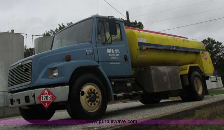 image for item I8910 1999 Freightliner FL70 fuel truck