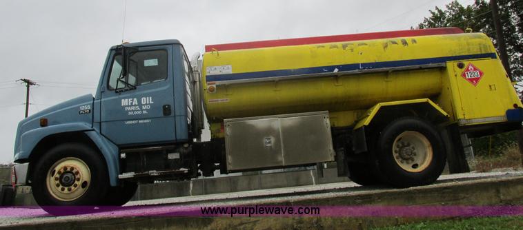 image for item I8910 1999 Freightliner FL70 fuel truck