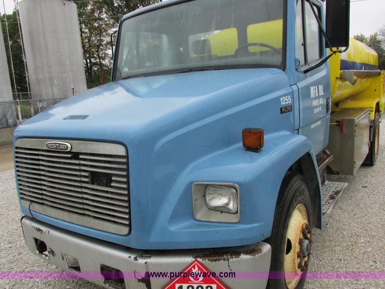 image for item I8910 1999 Freightliner FL70 fuel truck