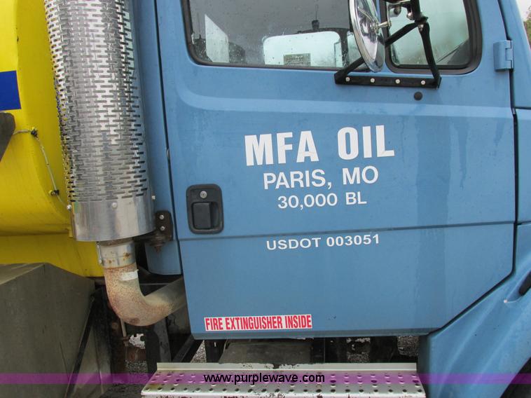 image for item I8910 1999 Freightliner FL70 fuel truck