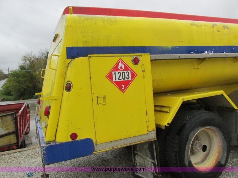 image for item I8910 1999 Freightliner FL70 fuel truck