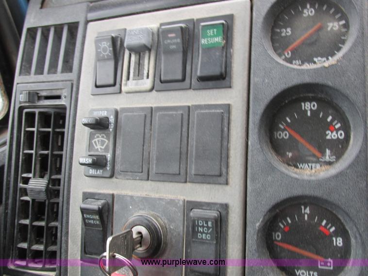 image for item I8910 1999 Freightliner FL70 fuel truck