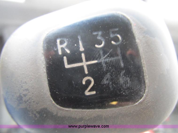 image for item I8910 1999 Freightliner FL70 fuel truck