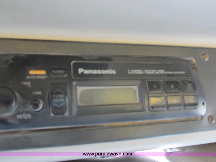 image for item I8910 1999 Freightliner FL70 fuel truck