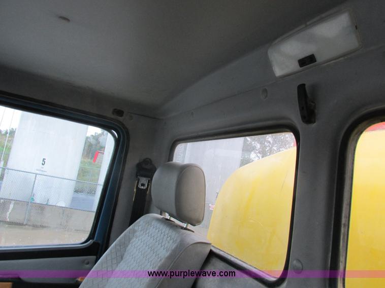 image for item I8910 1999 Freightliner FL70 fuel truck