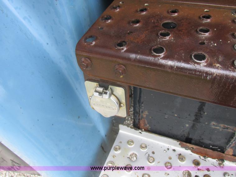 image for item I8910 1999 Freightliner FL70 fuel truck