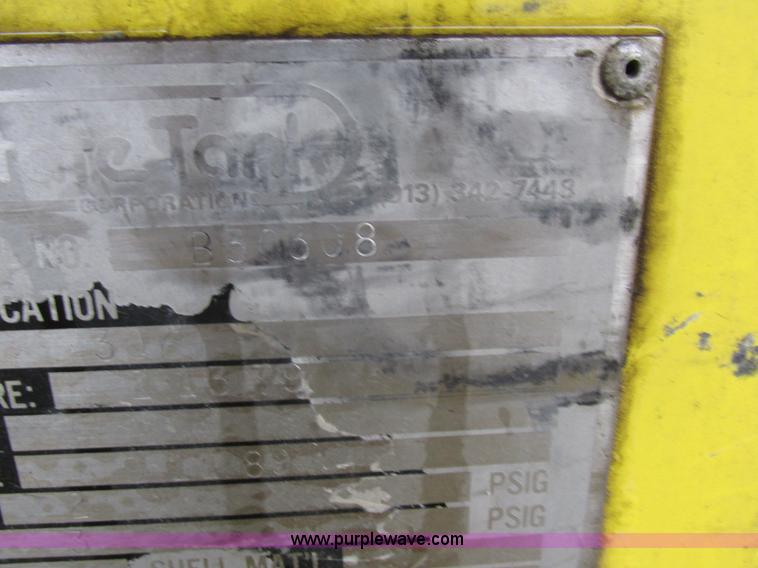 image for item I8910 1999 Freightliner FL70 fuel truck