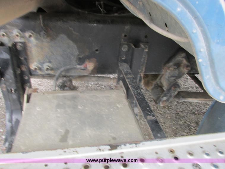 image for item I8910 1999 Freightliner FL70 fuel truck