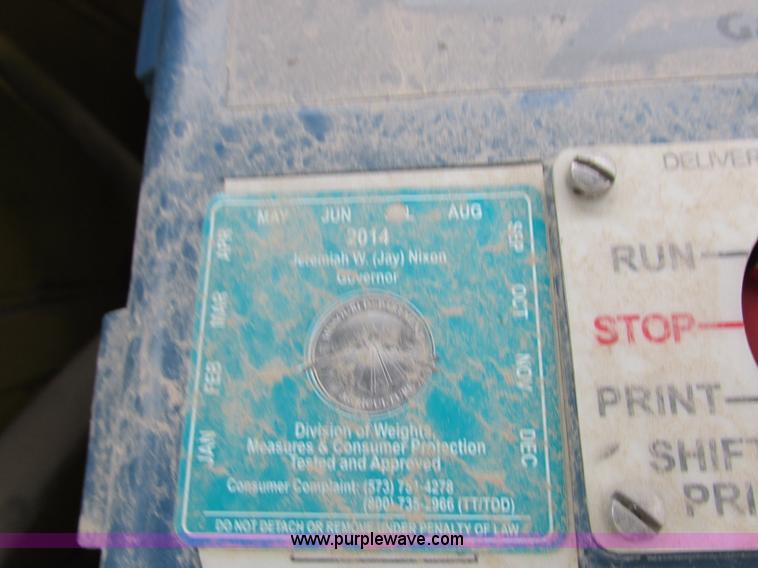 image for item I8910 1999 Freightliner FL70 fuel truck