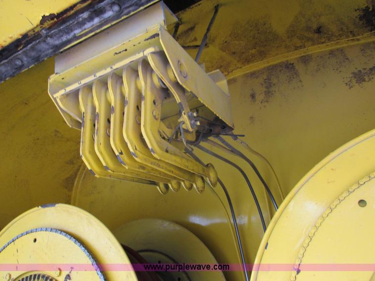 image for item I8910 1999 Freightliner FL70 fuel truck