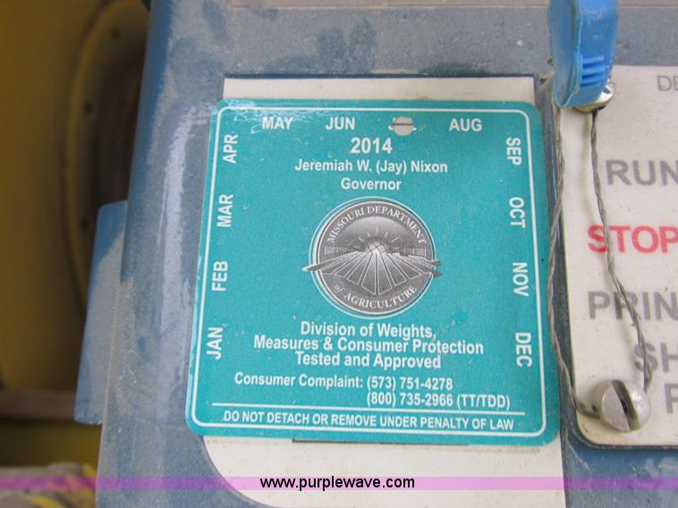 image for item I8910 1999 Freightliner FL70 fuel truck