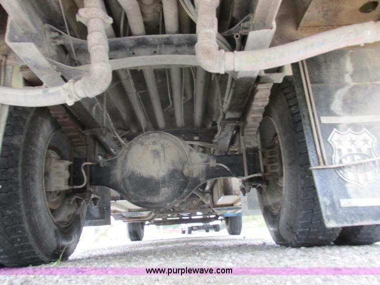 image for item I8910 1999 Freightliner FL70 fuel truck