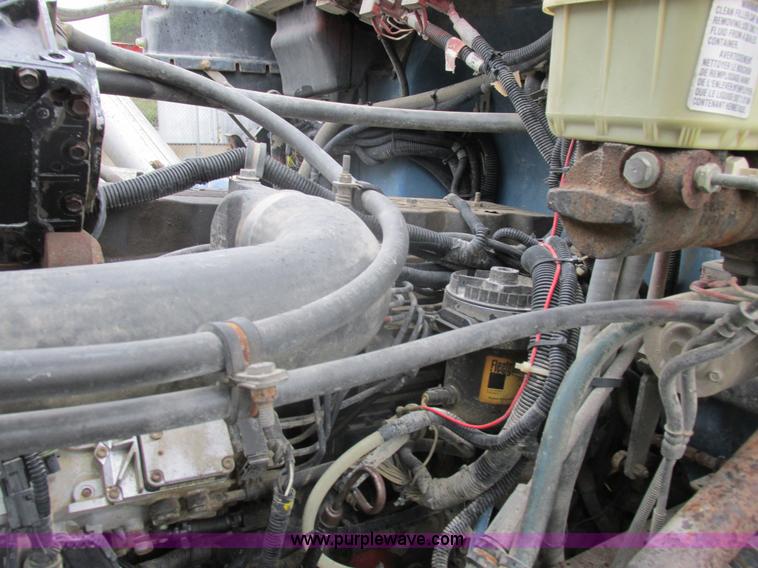 image for item I8910 1999 Freightliner FL70 fuel truck