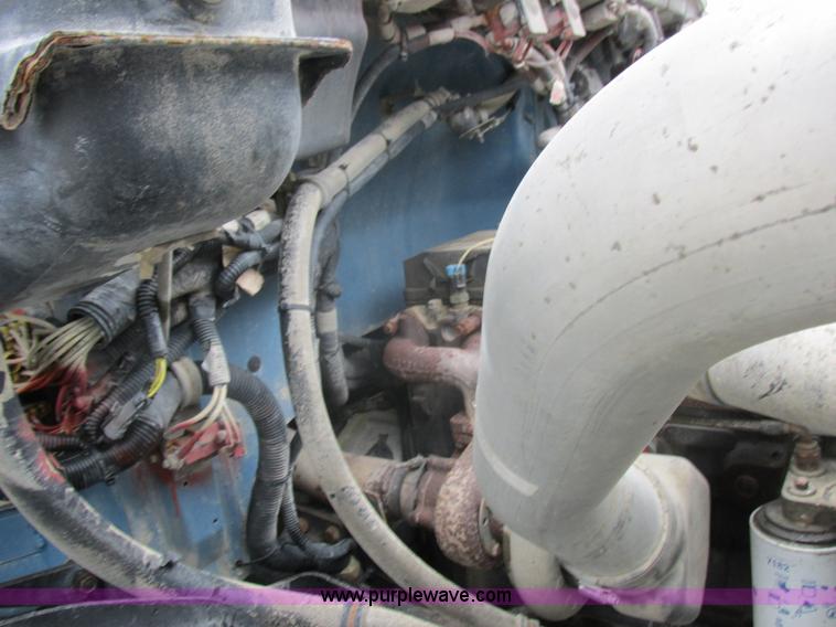 image for item I8910 1999 Freightliner FL70 fuel truck