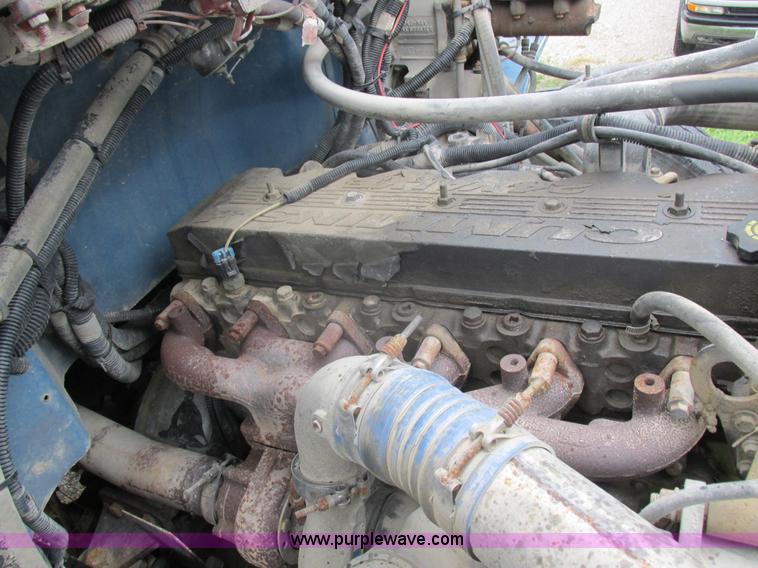 image for item I8910 1999 Freightliner FL70 fuel truck