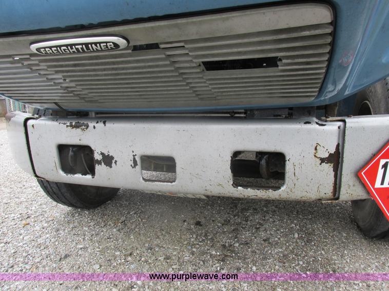 image for item I8910 1999 Freightliner FL70 fuel truck