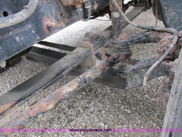 image for item I8910 1999 Freightliner FL70 fuel truck