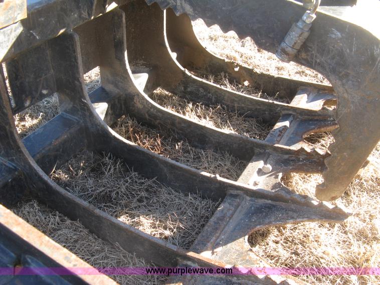 image for item K2784 Caterpillar 286-9300 root grapple bucket