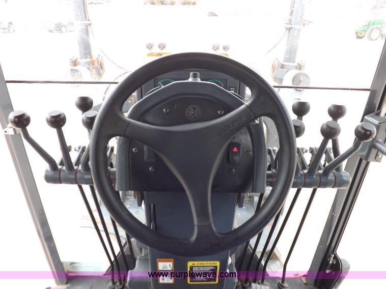 image for item K3115 2008 John Deere 772D articulated motor grader