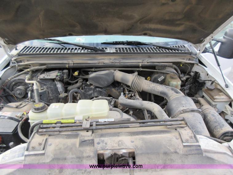 image for item AW9105 2002 Ford F350 Super Duty XL Crew Cab flatbed truck