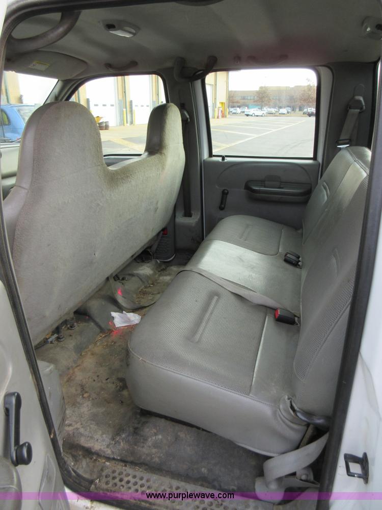 image for item AW9105 2002 Ford F350 Super Duty XL Crew Cab flatbed truck