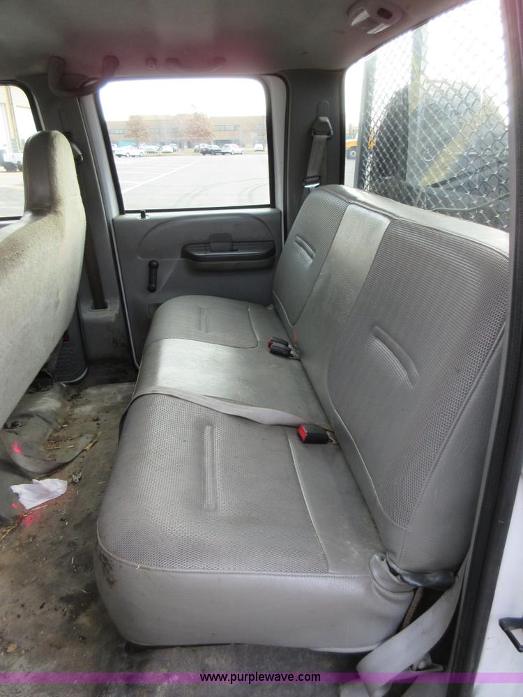 image for item AW9105 2002 Ford F350 Super Duty XL Crew Cab flatbed truck