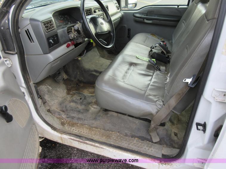 image for item AW9105 2002 Ford F350 Super Duty XL Crew Cab flatbed truck