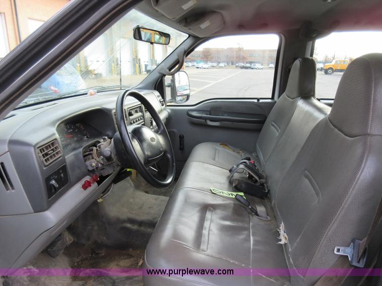 image for item AW9105 2002 Ford F350 Super Duty XL Crew Cab flatbed truck