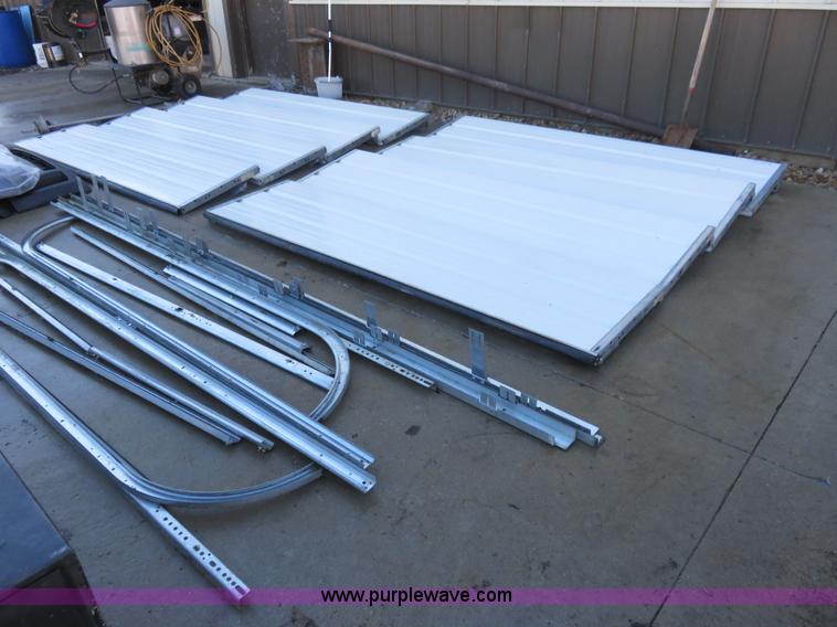 image for item BM9995 (2) 8' x 8' garage doors