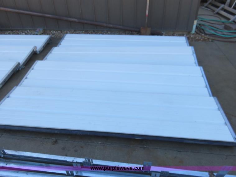 image for item BM9995 (2) 8' x 8' garage doors