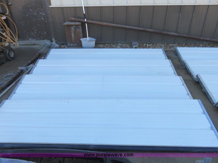 image for item BM9995 (2) 8' x 8' garage doors