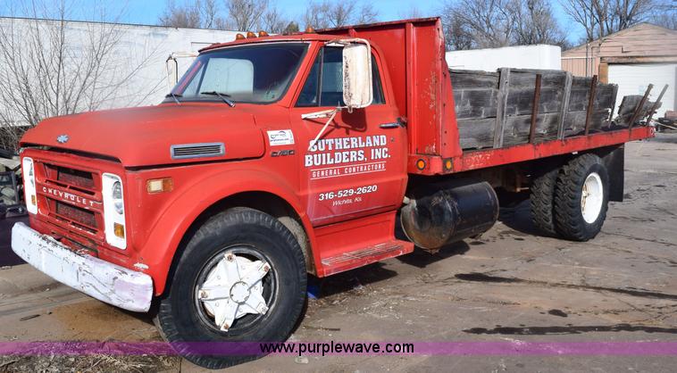 image for item E6137 1972 Chevrolet C60 flatbed dump truck