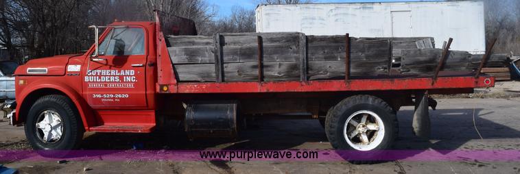 image for item E6137 1972 Chevrolet C60 flatbed dump truck