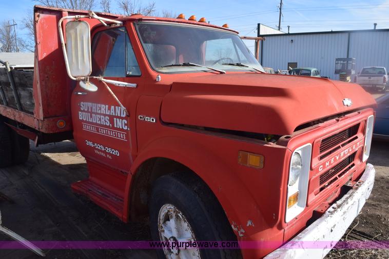 image for item E6137 1972 Chevrolet C60 flatbed dump truck