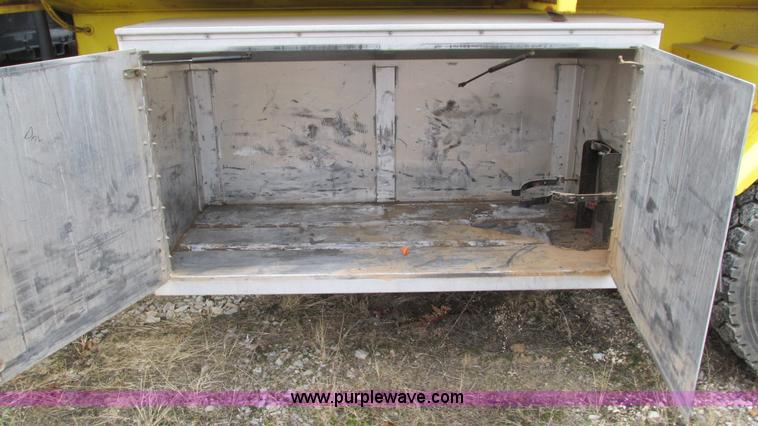 image for item I3113 1998 Freightliner FL70 Business Class fuel truck