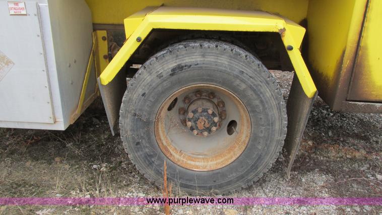 image for item I3113 1998 Freightliner FL70 Business Class fuel truck