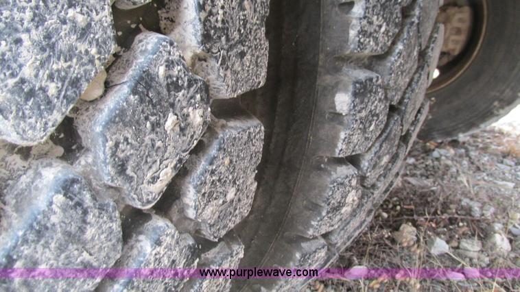 image for item I3113 1998 Freightliner FL70 Business Class fuel truck