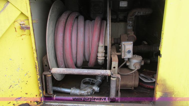 image for item I3113 1998 Freightliner FL70 Business Class fuel truck