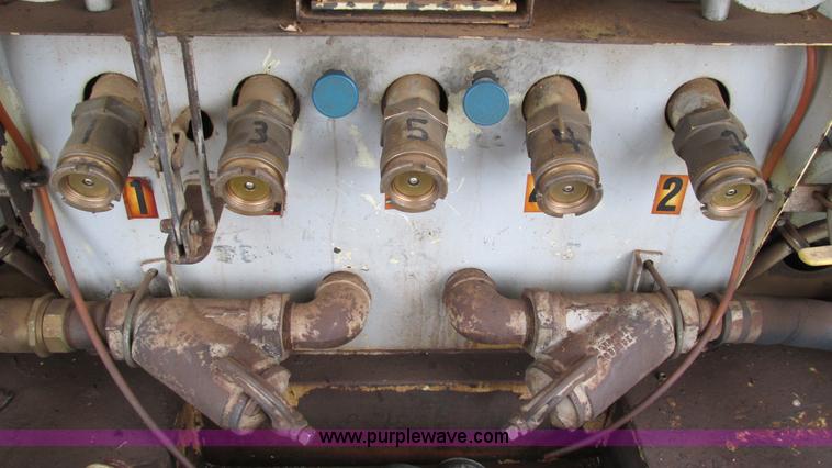 image for item I3113 1998 Freightliner FL70 Business Class fuel truck