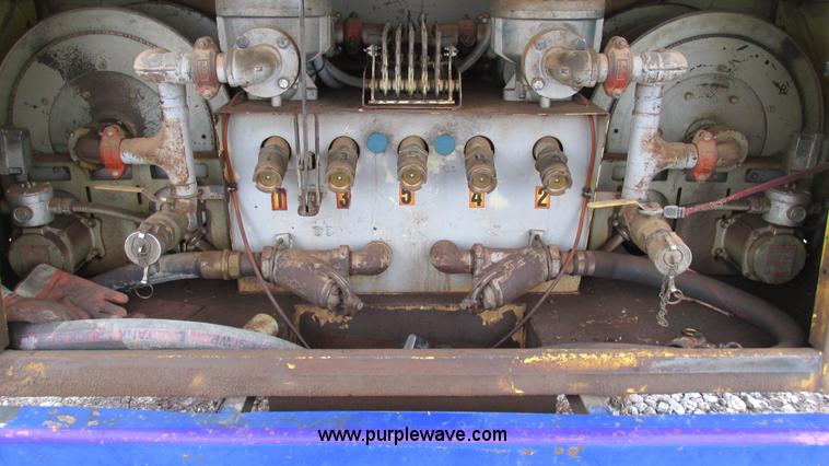 image for item I3113 1998 Freightliner FL70 Business Class fuel truck