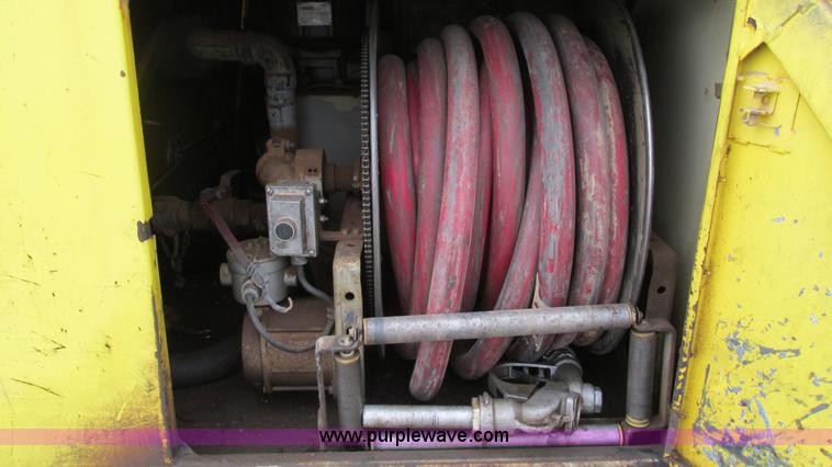 image for item I3113 1998 Freightliner FL70 Business Class fuel truck