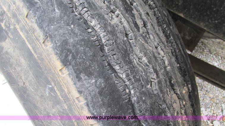 image for item I3113 1998 Freightliner FL70 Business Class fuel truck