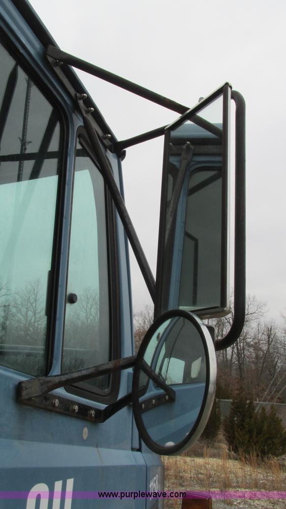 image for item I3113 1998 Freightliner FL70 Business Class fuel truck