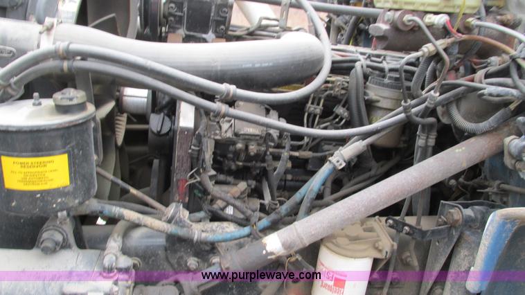 image for item I3113 1998 Freightliner FL70 Business Class fuel truck