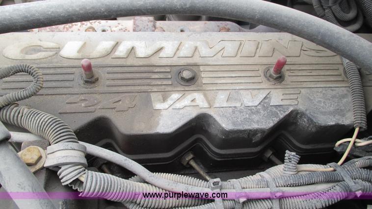 image for item I3113 1998 Freightliner FL70 Business Class fuel truck