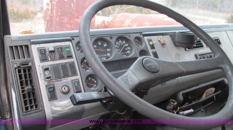 image for item I3113 1998 Freightliner FL70 Business Class fuel truck