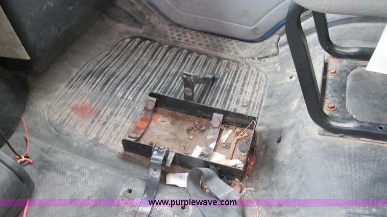 image for item I3113 1998 Freightliner FL70 Business Class fuel truck