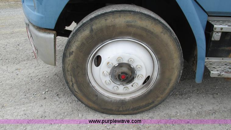 image for item I3114 1998 Freightliner FL70 Business Class fuel truck